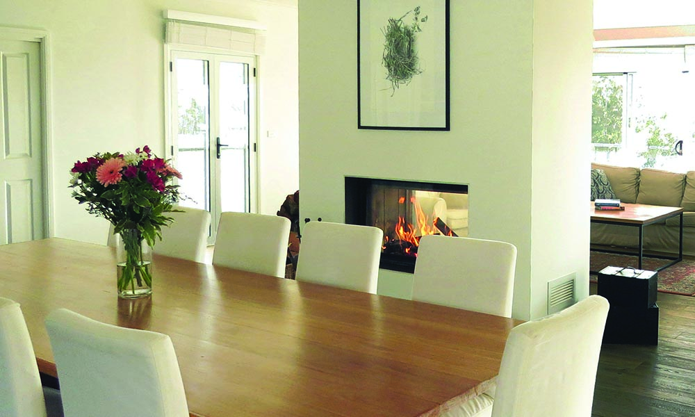 Dining room with double sided fireplace